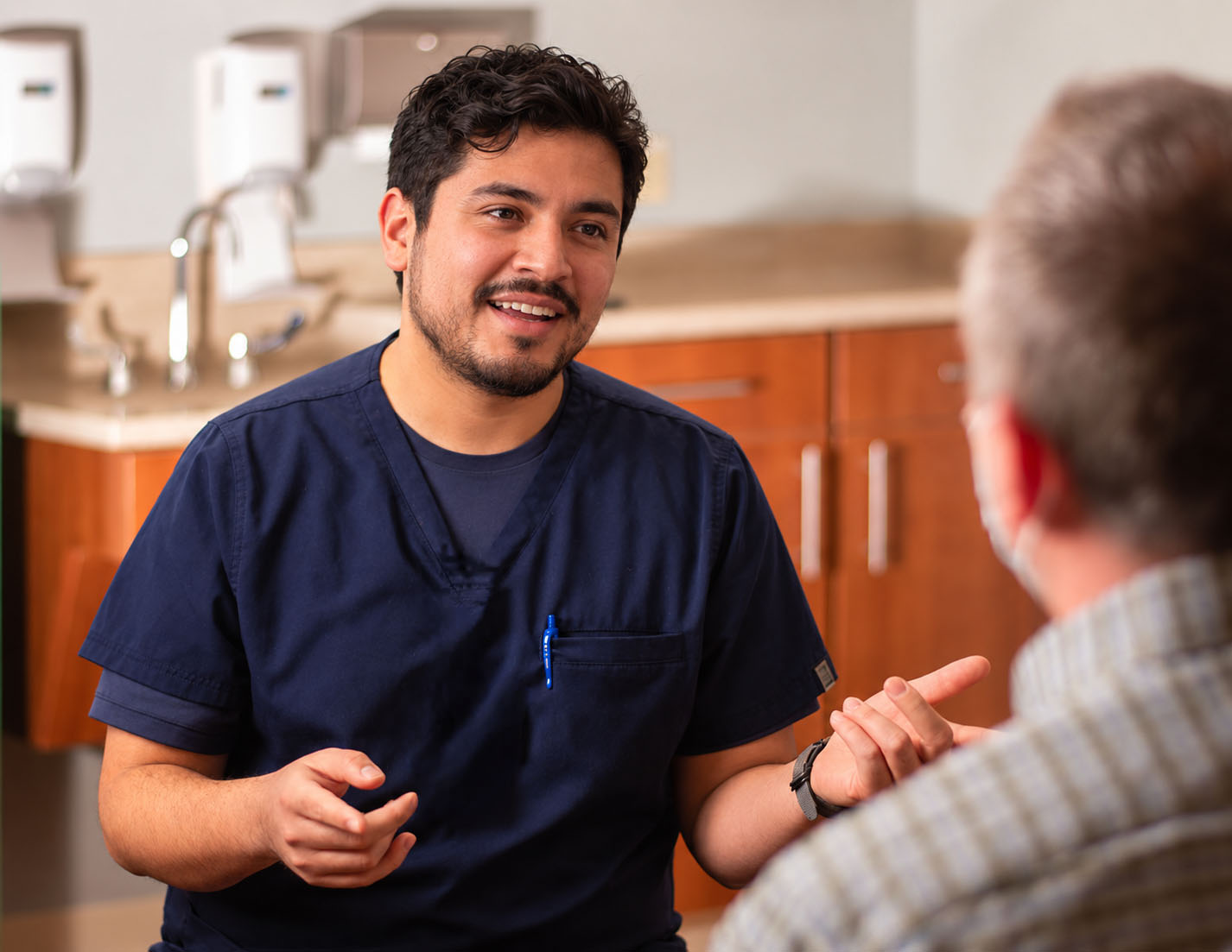 CRH nurse speaking with a patient